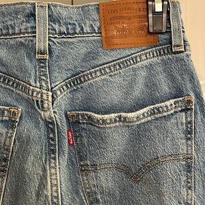 Classic Levi’s premium 70s high flare medium wash jeans